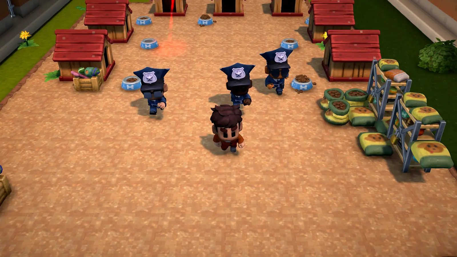 Official The Escapists 3 press screenshot of an inmate sneaking through a dog kennel yard past three patrolling guards, with dog houses, food bowls and sacks of dog food around the run