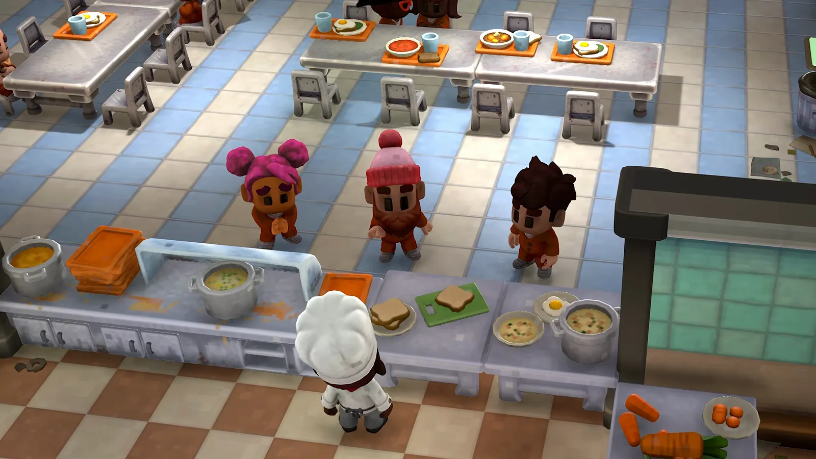 Three inmates queue with trays at a cafeteria counter while a chef in white serves food in a top-down scene from The Escapists 3’s announcement trailer